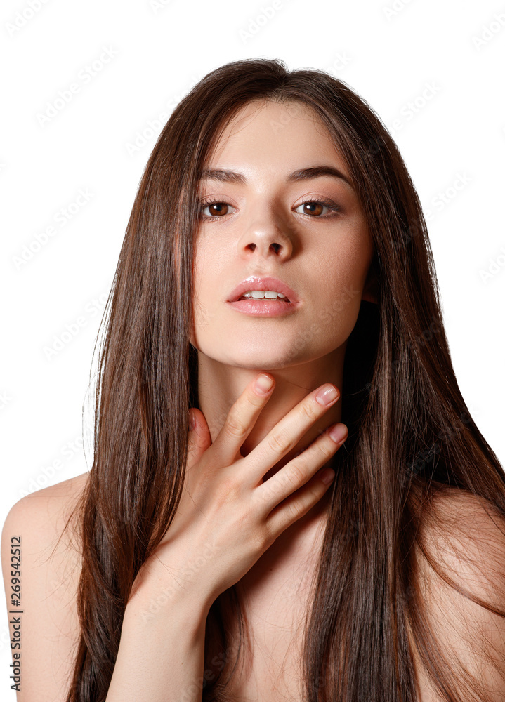 beauty portrait of a young beautiful brunette girl with brown eyes and straight long flowing hair isolated on white background beauty portrait of a young beautiful brunette girl with brown eyes and straight long flowing hair isolated on white background