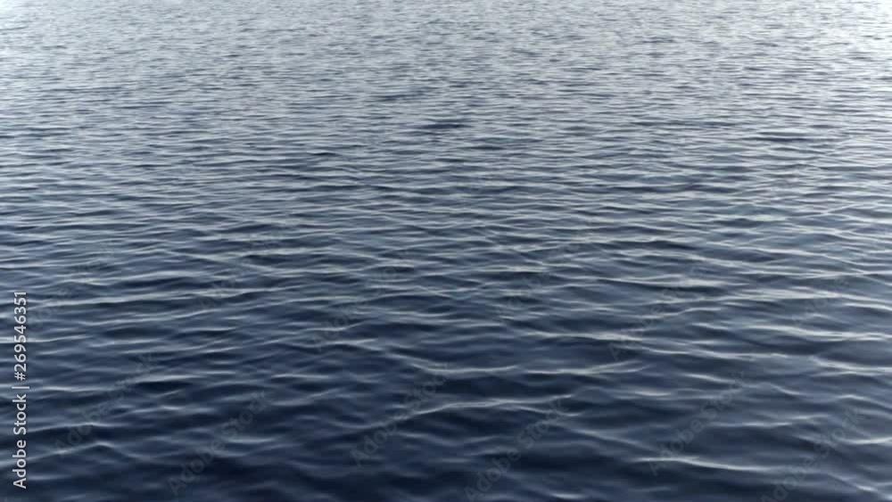 Flying Over the Water Surface. Light wave on the sea surface. Slow Motion at a rate of 240 fps Flying Over the Water Surface. Light wave on the sea surface. Slow Motion at a rate of 240 fps