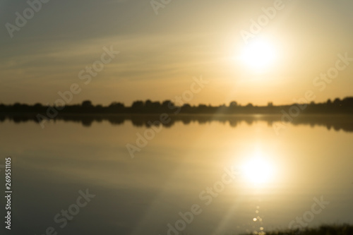 sunset on the lake, blurred background