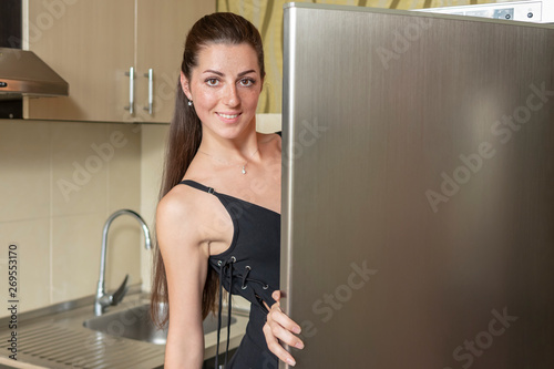 portrait of a woman at the fridge
