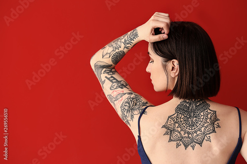 Beautiful tattooed woman on...