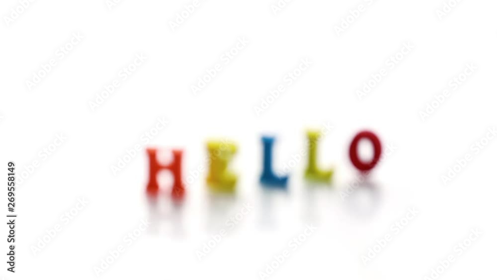 Greeting, pop-up from rasfokusa, on a white background, composed of colored letters Greeting, pop-up from rasfokusa, on a white background, composed of colored letters
