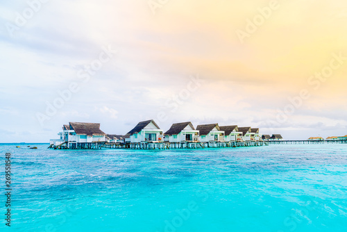Fototapeta Naklejka Na Ścianę i Meble -  tropical Maldives resort hotel and island with beach and beautiful sky