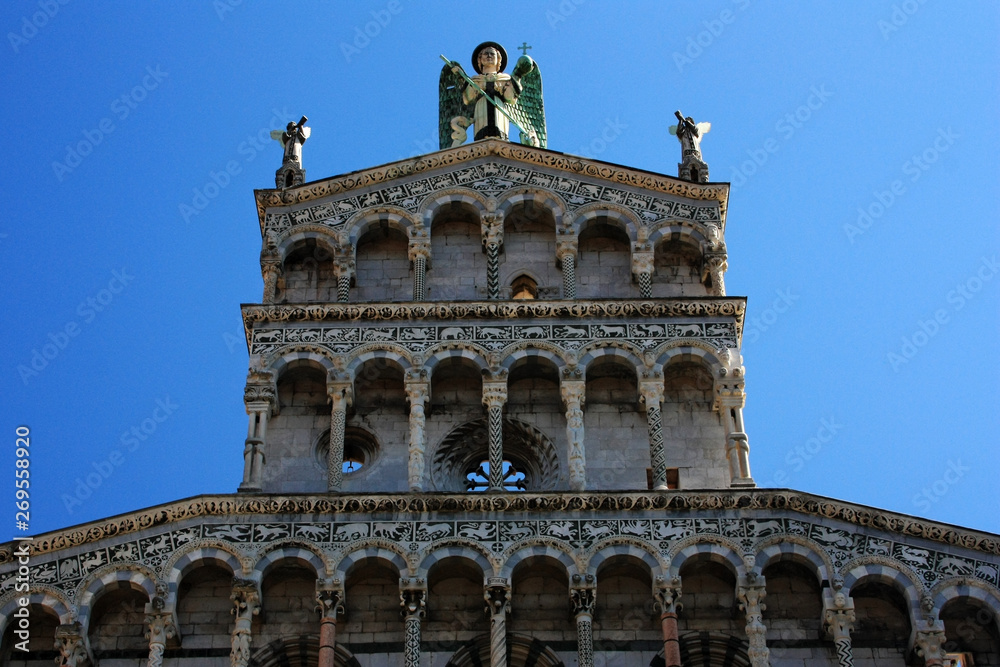 Angel with wings at the cathedral in Lucca, Italy