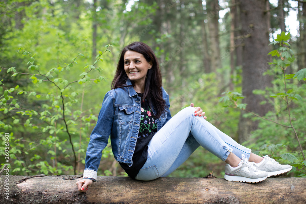 nice mature woman walking in the forest nice mature woman walking in the forest