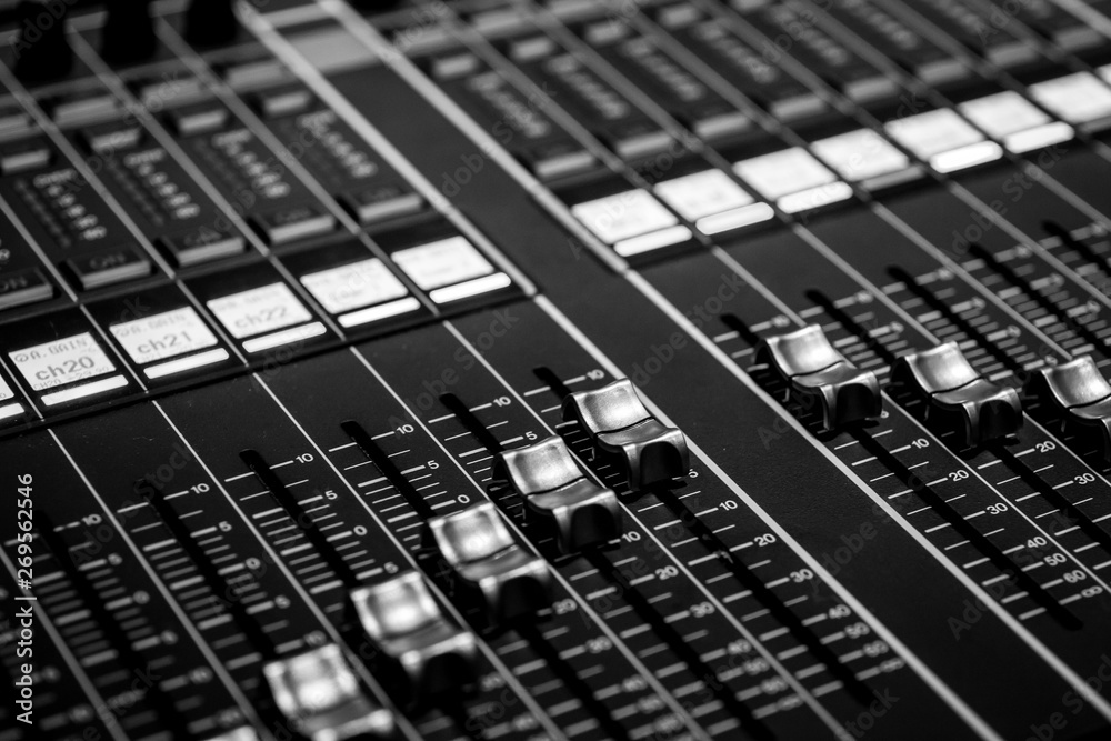 Closeup view of Faders on Professional digital Audio Sound mixing control Console Stock Photo
