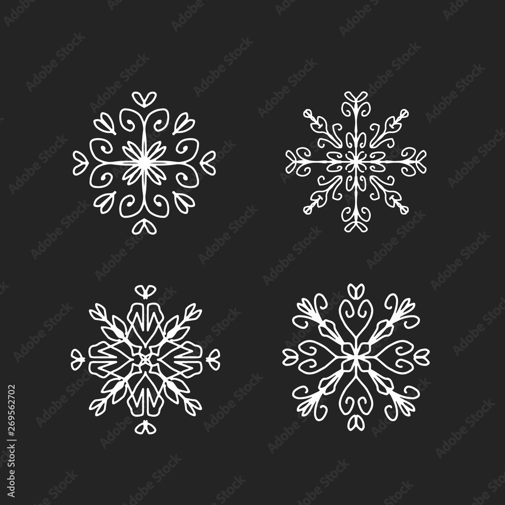 White abstract ornaments on black chalkboard White abstract ornaments on black chalkboard