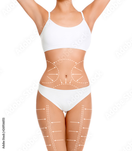 Young slim woman with arrows on body against white background, closeup. Beauty and health concept