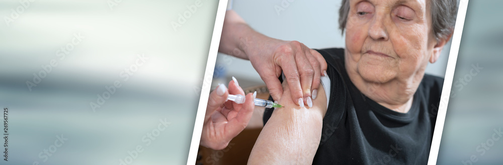 Senior woman getting an injection. panoramic banner