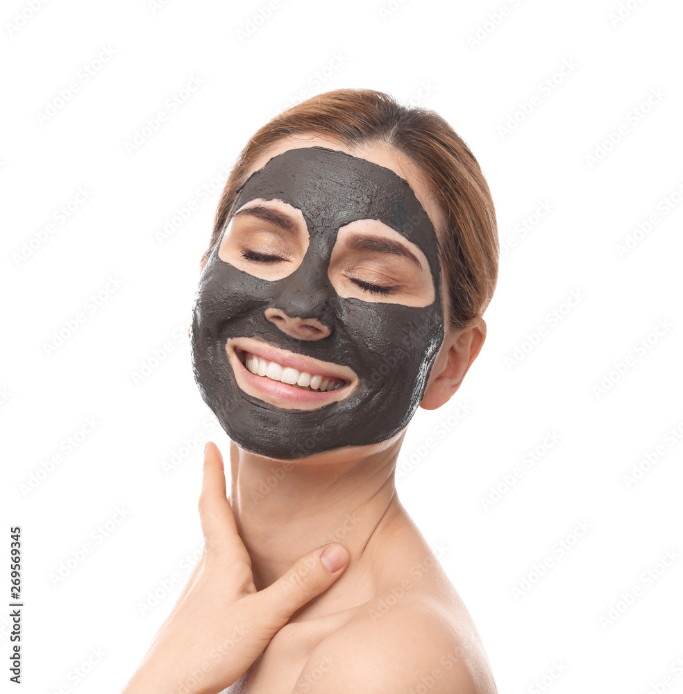 Beautiful woman with black mask on face against white background Beautiful woman with black mask on face against white background