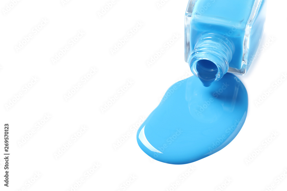 Spilled color nail polish with bottle on white background Spilled color nail polish with bottle on white background
