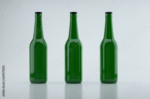 Three green glass beer bottles. Image to insert label.