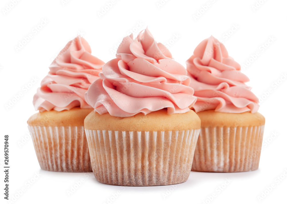 Delicious cupcakes with cream on white background Delicious cupcakes with cream on white background