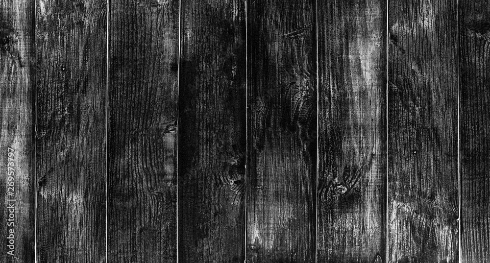 Black wood floor texture and background. For background design and advertising work Black wood floor texture and background. For background design and advertising work