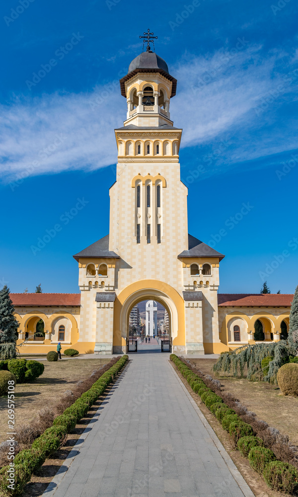 Beautiful view to the Coronation Reunification Cathedral Bell Tower in Alba Iulia city, Romania. A Bell Tower on a sunny day in Alba Iulia, Romania