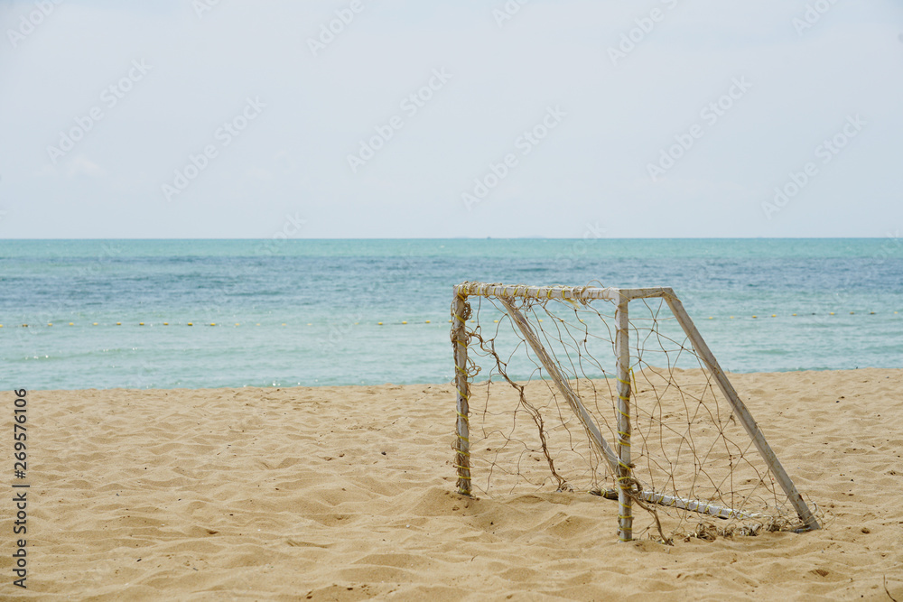 Beach football goal on a sunny day this is popular sport on the beach Beach football goal on a sunny day this is popular sport on the beach