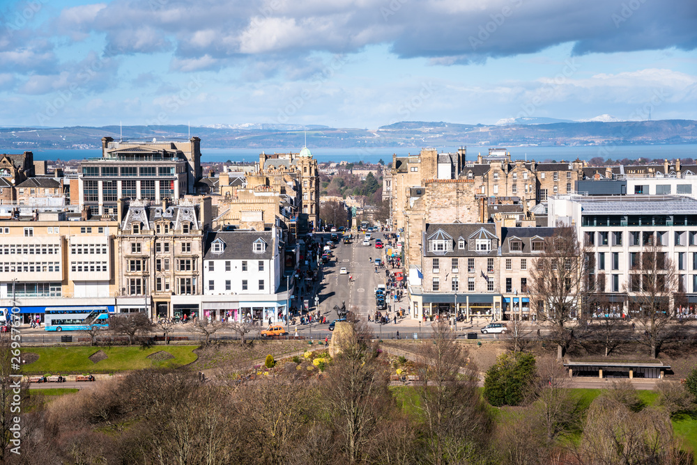 Edinburgh city centre on a sunny winter day. The firth of Forth is visible in background