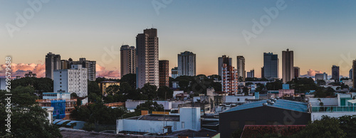 Panoramic downtown sunset skyline of high-rise buildings in the city of Foz do Iguacu, Brazil photo