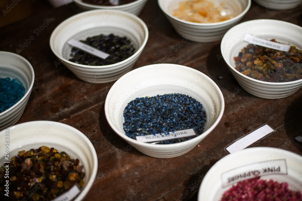 Porcelain bowls with samples of precious and semiprecious stones in a jewelry factory in Halle Sri Lanka Porcelain bowls with samples of precious and semiprecious stones in a jewelry factory in Halle Sri Lanka