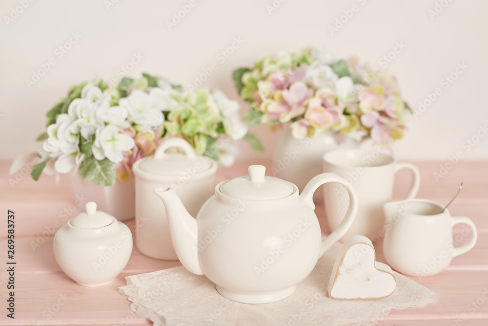 tea and coffee set on the table on a white background tea and coffee set on the table on a white background