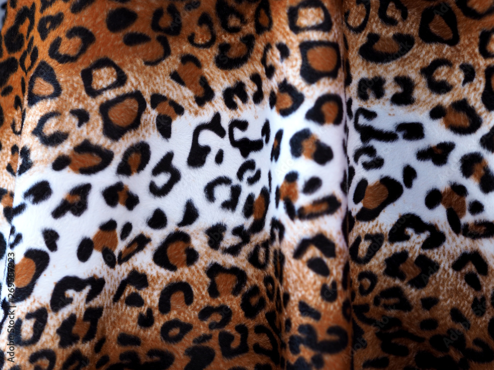 Closeup Leopard leather fabric background. Closeup Leopard leather fabric background.