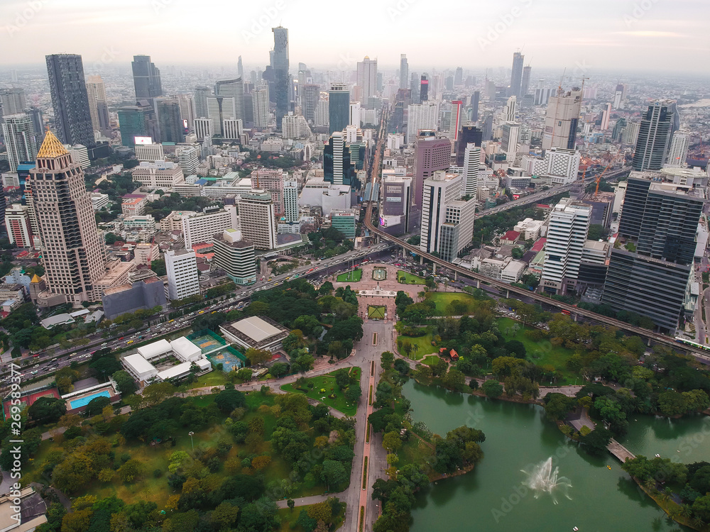 Naklejka premium Bangkok midtown city building with BTS sky train aerial view