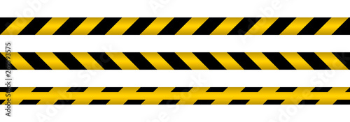 Yellow warning tapes on white background © Andrey Prokhorov