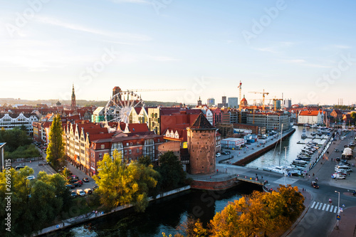 Sunny day view of Brama Stagiewna and other historical buildings in Gdansk, Poland