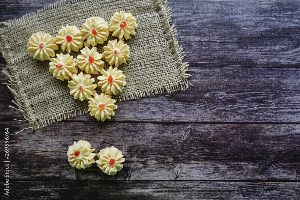 A malay traditional cookies called Kuih Semperit Dahlia served during Eid Fitri. Top view and flat lay concept. A malay traditional cookies called Kuih Semperit Dahlia served during Eid Fitri. Top view and flat lay concept.