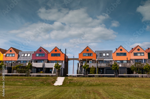 Beautiful colored houses in Stavoren at the IJssellake, region Gaasterland, province Friesland