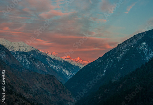 scene of sunset on Mountain Peaks In Indian Himalaya