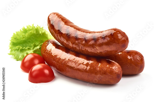 Grilled pork sausages with lettuce, close-up, isolated on white background