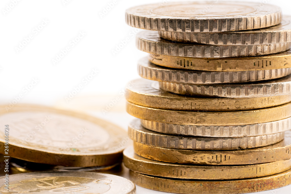 coins stacked on each other in different positions. coins stacked on each other in different positions.