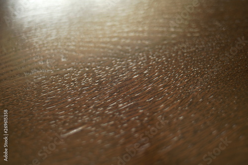 wooden surface of brown color close up 