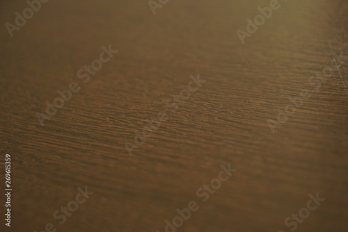 wooden surface of brown color close up 