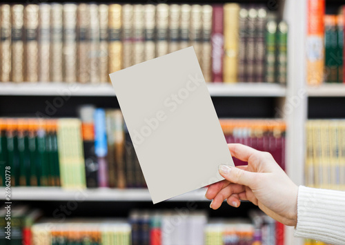 collection of various white paper on white background. a book under the library.