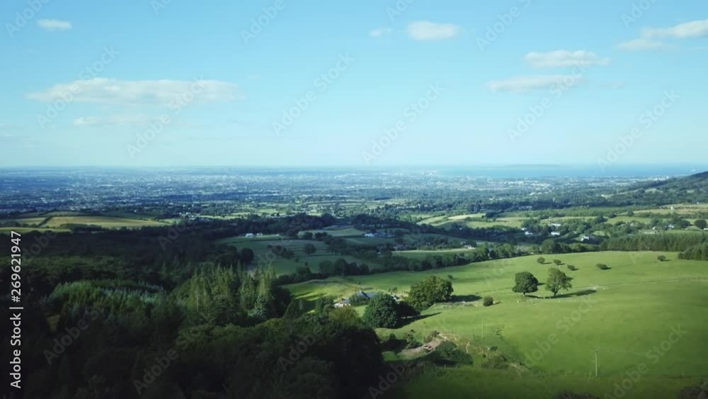 AERIAL DOLLY IN Beautiful green fields on hills near Dublin AERIAL DOLLY IN Beautiful green fields on hills near Dublin