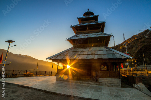 Kullu, Himachal Pradesh, India - December 07, 2018 : Sunset at manu rishi temple in himachal photo