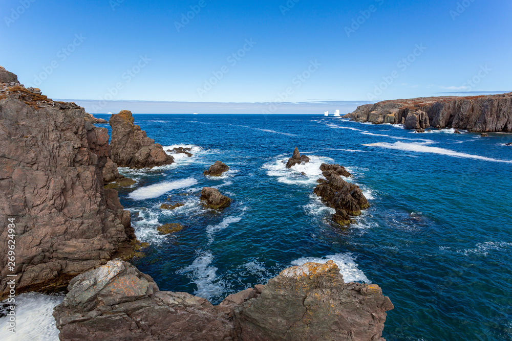 An iceberg along the Newfoundland coastline in summer, very popular with tourist.