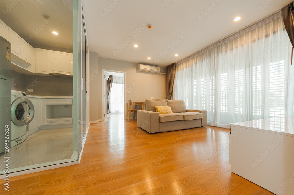 Modern living room and kitchen in small apartment Modern living room and kitchen in small apartment