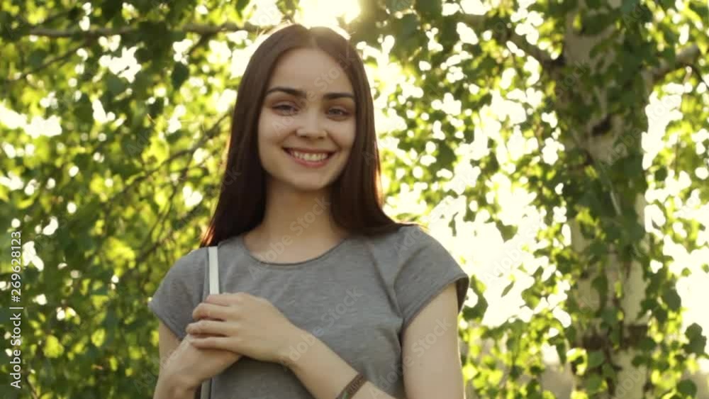 Young beautiful girl. Woman portrait in the forest. Spring vibes Young beautiful girl. Woman portrait in the forest. Spring vibes