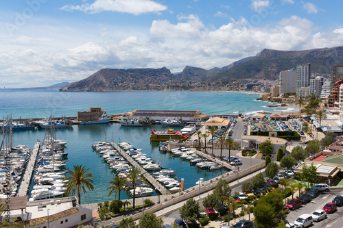 Calp Spain marina and yachts and boats also known for the famous rock landmark Penon de Ilfach © acceleratorhams
