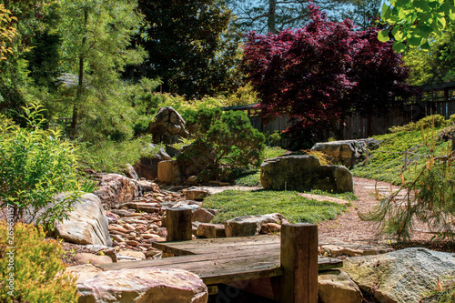 old wood bridge in japanese garden