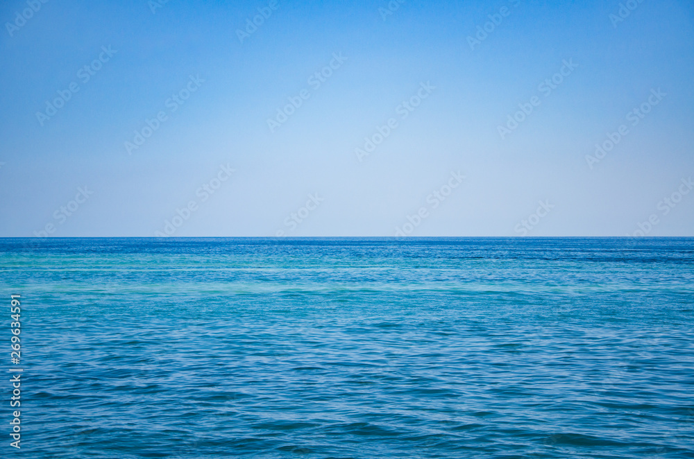 Seascape, view of sea horizon and blue sky Seascape, view of sea horizon and blue sky