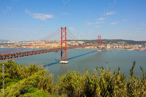 Panoramic view of the 25 de Abril Bridge crossing the Tagus River in Lisbon, Portugal