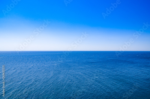 Seascape, view of sea horizon and blue sky