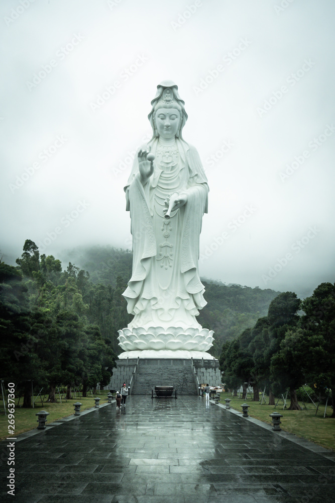 Hong Kong / China - Feb 18 2019: Tsz Shan Monastery. White Big Guanyim Staue  in Hong Kong