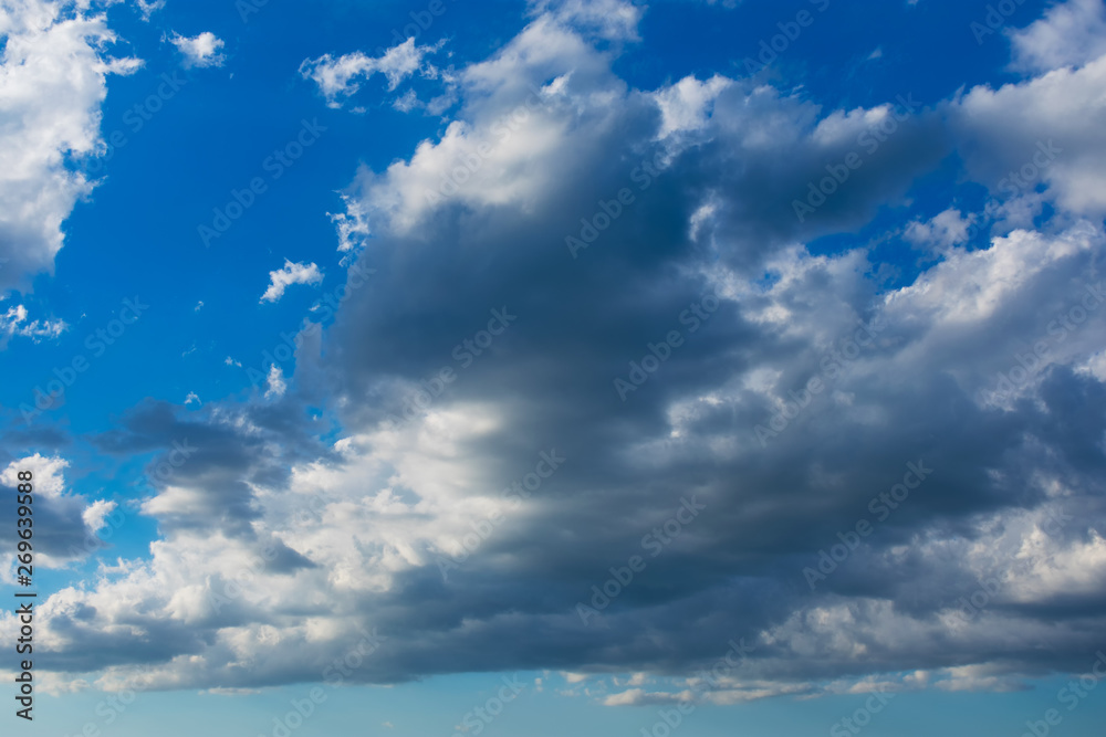 Blue sky with clouds. Blue sky with nimbostratus clouds. Blue sky with clouds background.