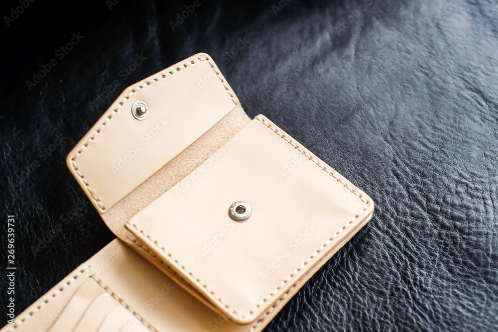 Genuine leather bifold card bill wallet on black Genuine leather bifold card bill wallet on black