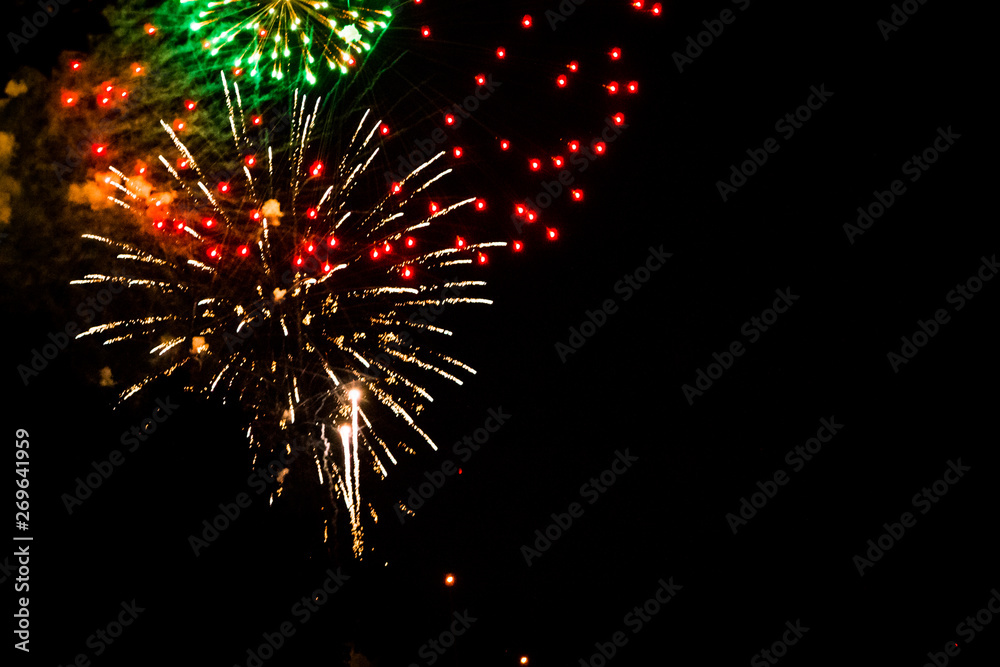 Firework display lighting up the night sky in Grand Rapids Michigan Firework display lighting up the night sky in Grand Rapids Michigan